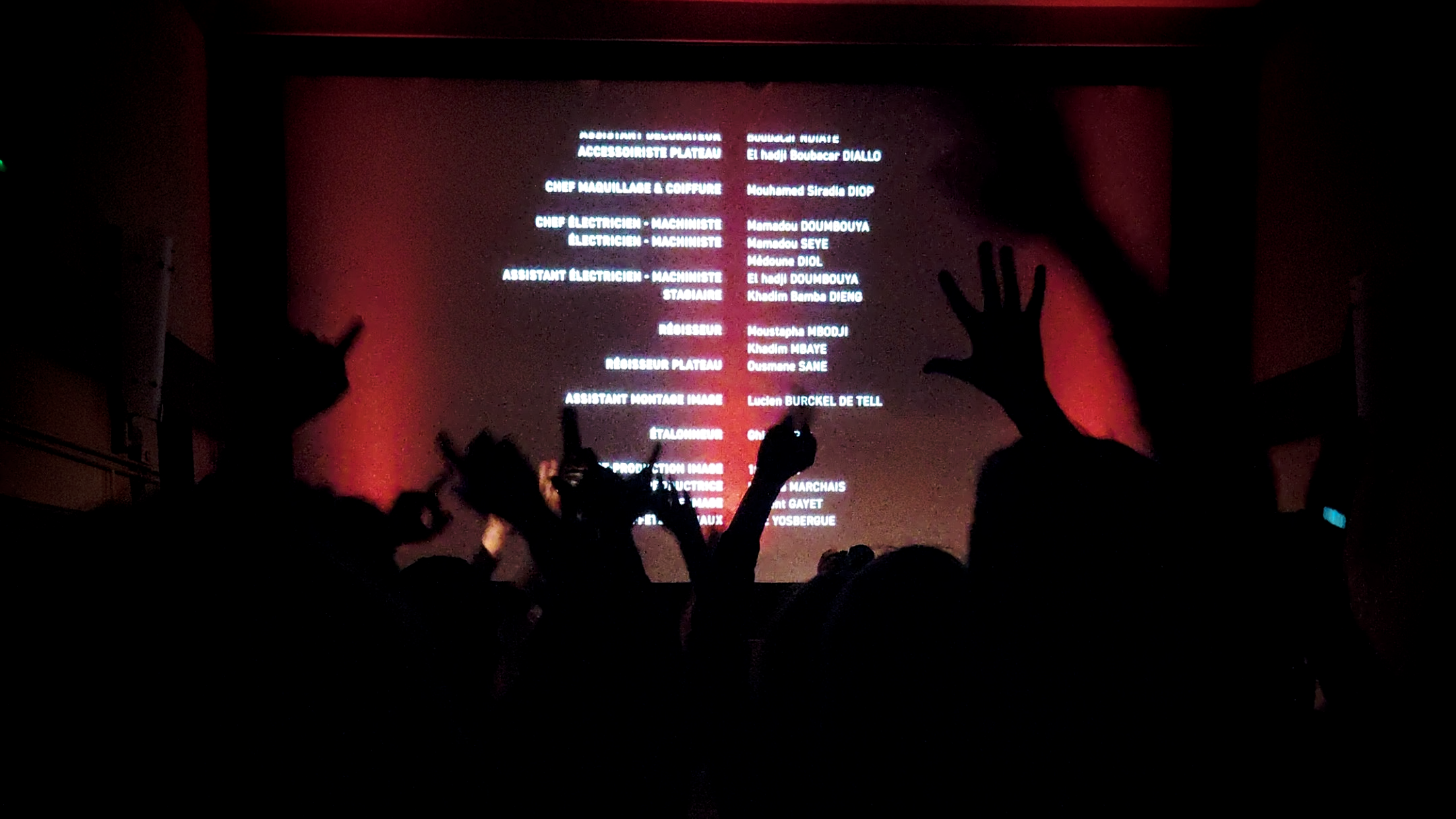 Hands up during the credits — the film ends and nobody sits back down.